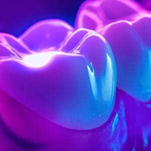 A tooth with a neon spot suggesting where the amalgam will be removed